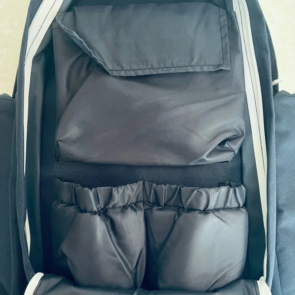 Baby Bjorn Navy Blue diaper and two bottle baby backpack.